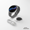 Samsung Galaxy Watch and wireless charger bundle on white background